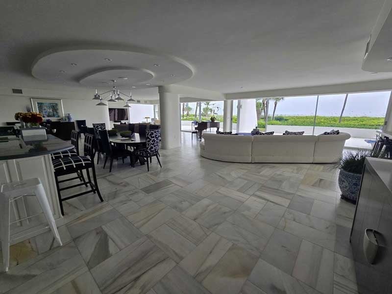 living room with large glass windows